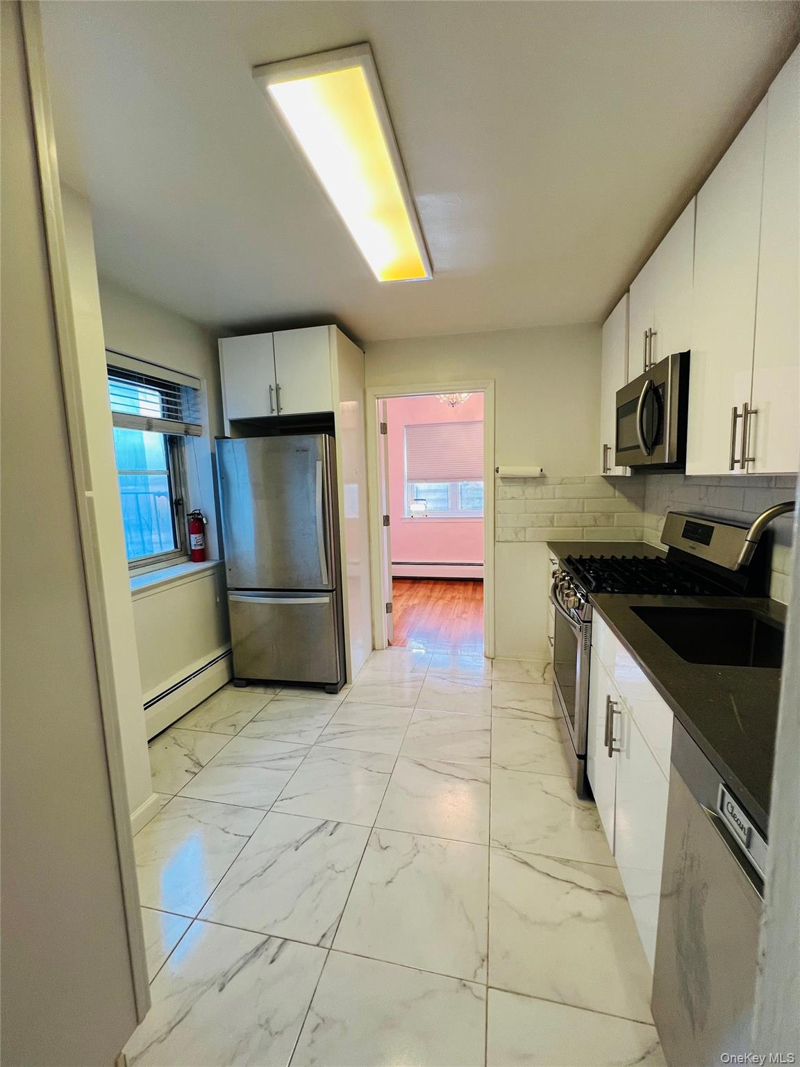 #12 photo, 9910 60th Avenue, Corona , NY 11368