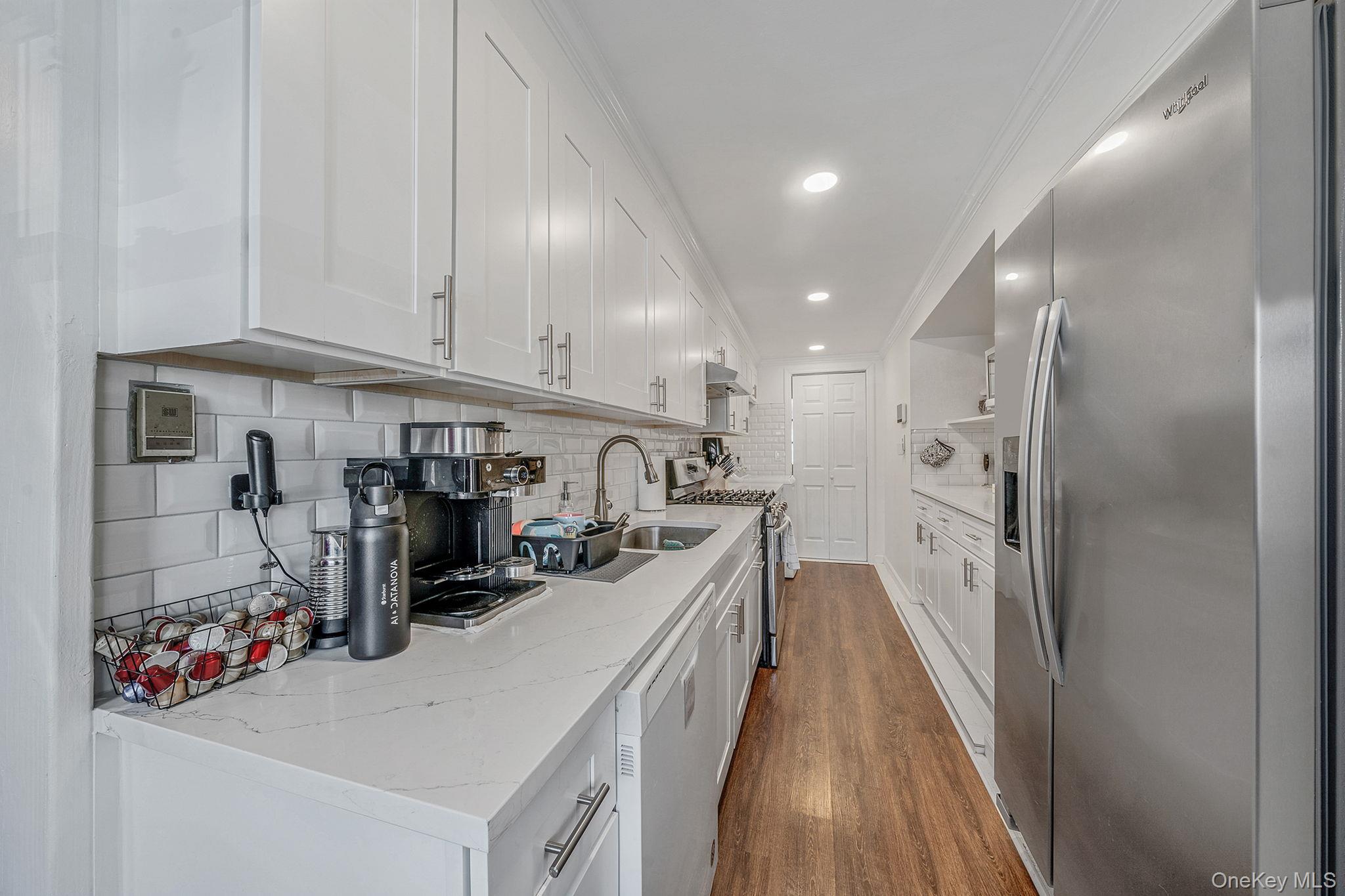 #13 photo, 694 Whittier Street, Westbury , NY 11590