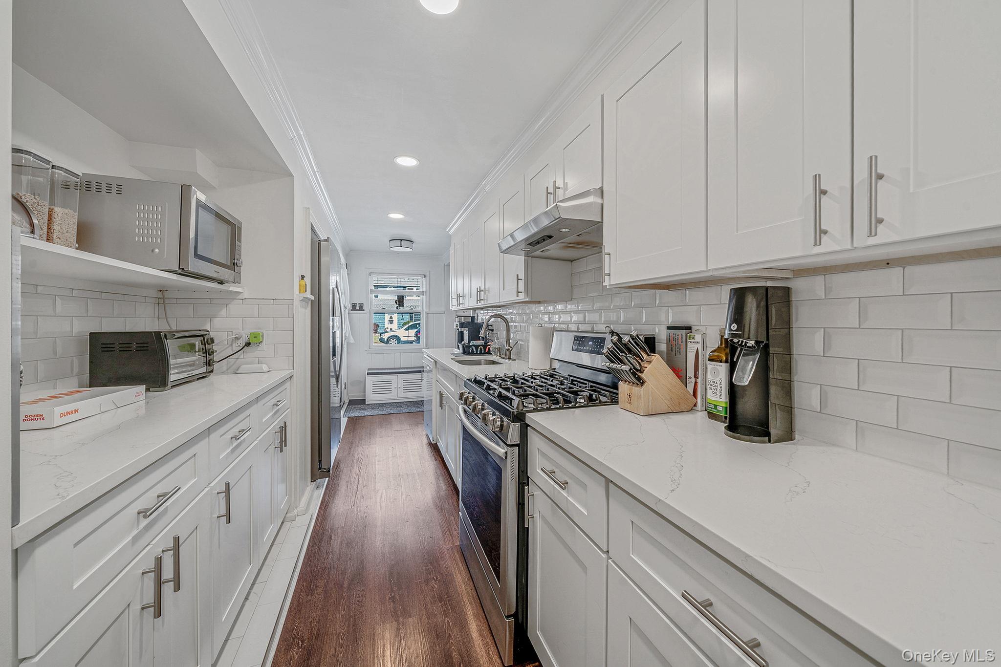 #15 photo, 694 Whittier Street, Westbury , NY 11590