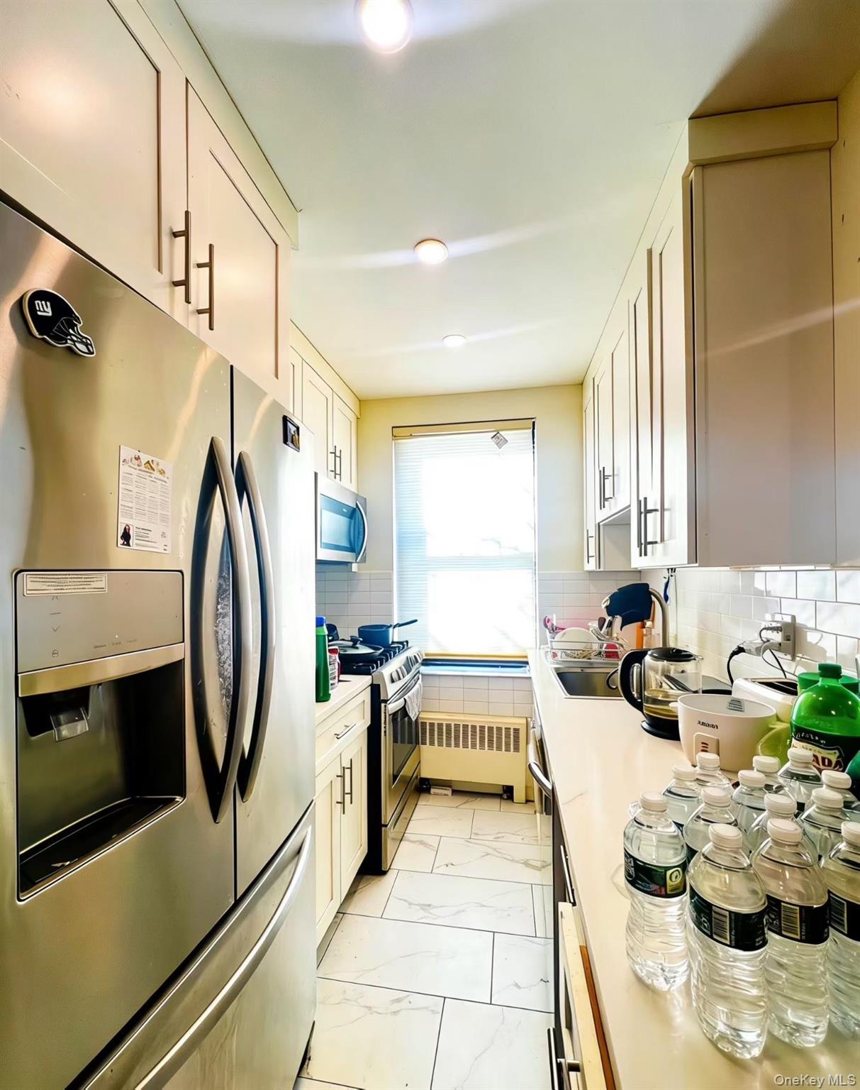 #3 photo, 71-43 Park Drive East, Kew Garden Hills , NY 11367