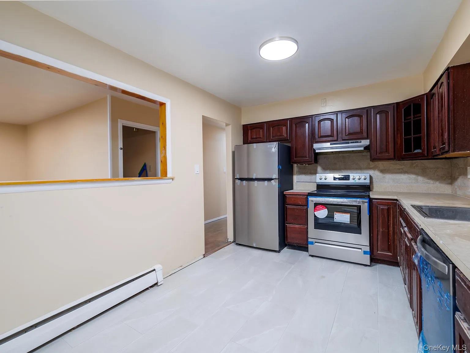 #3 photo, 220 Benson Avenue, नासाउ काउंटी Elmont , NY 11003