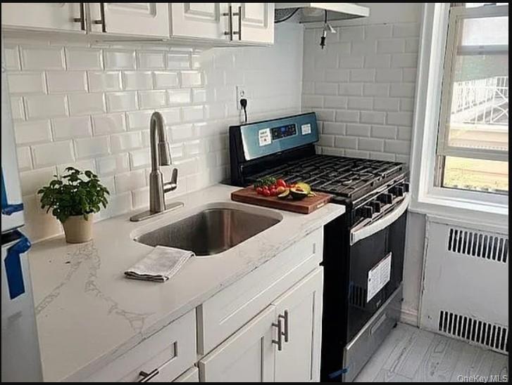 #3 photo, 84-49 168th St, Jamaica Estates , NY 11432