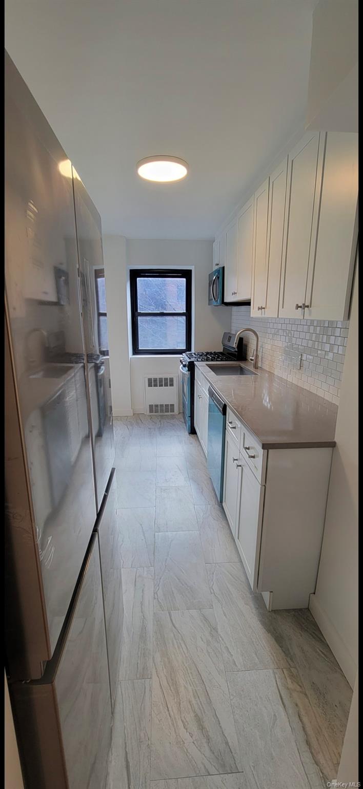 #9 photo, 102-25 67th Road, קווינס Forest Hills , NY 11375