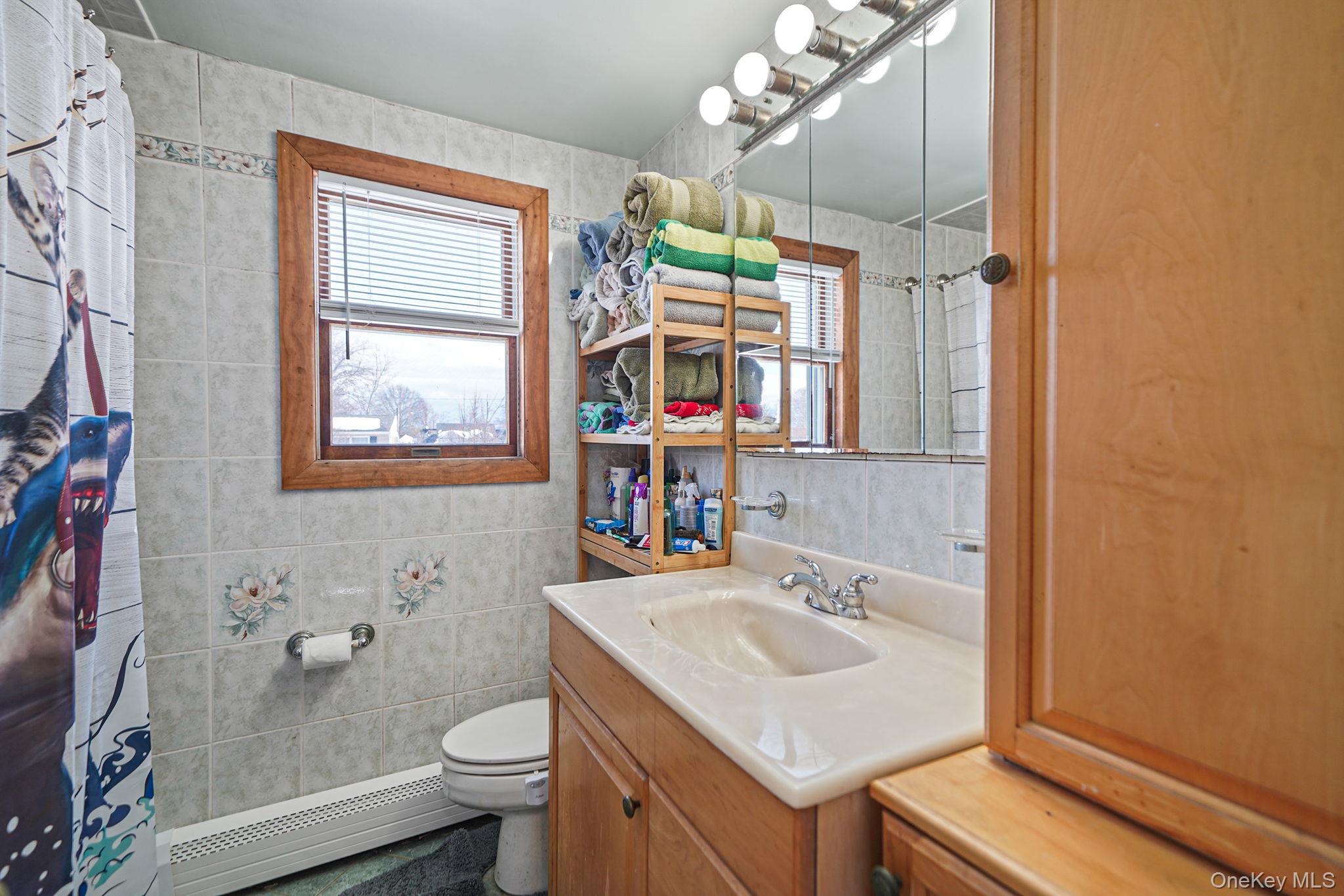 #20 photo, 68 Coppersmith Road, Levittown , NY 11756