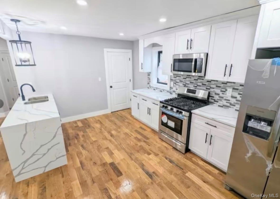 #6 photo, 13003 Springfield Boulevard, Laurelton , NY 11413