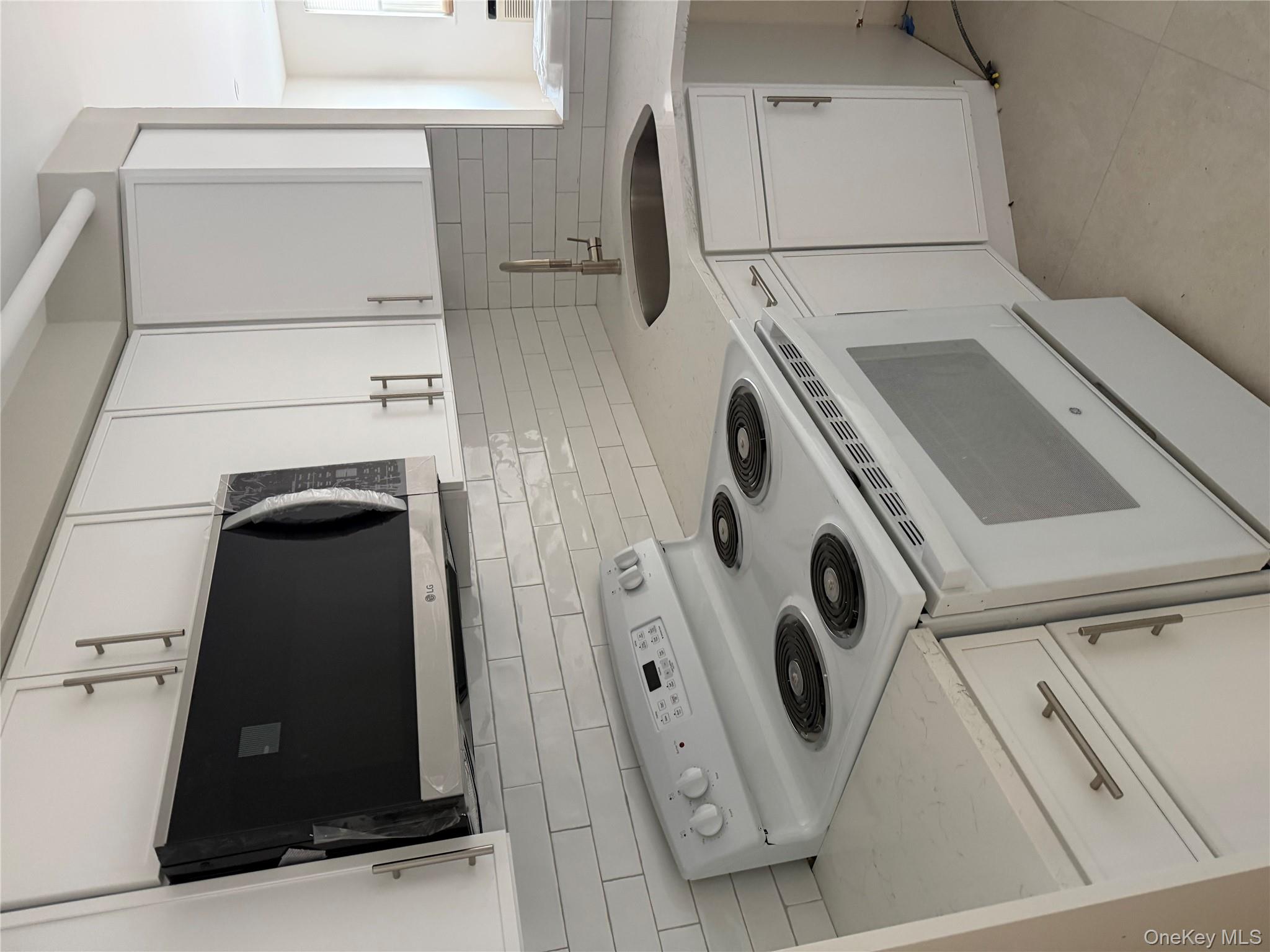 #6 photo, 320 Post Avenue, Westbury , NY 11590