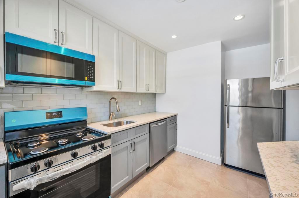 #8 photo, 220-44 73rd Avenue, كوينز Oakland Gardens , NY 11364