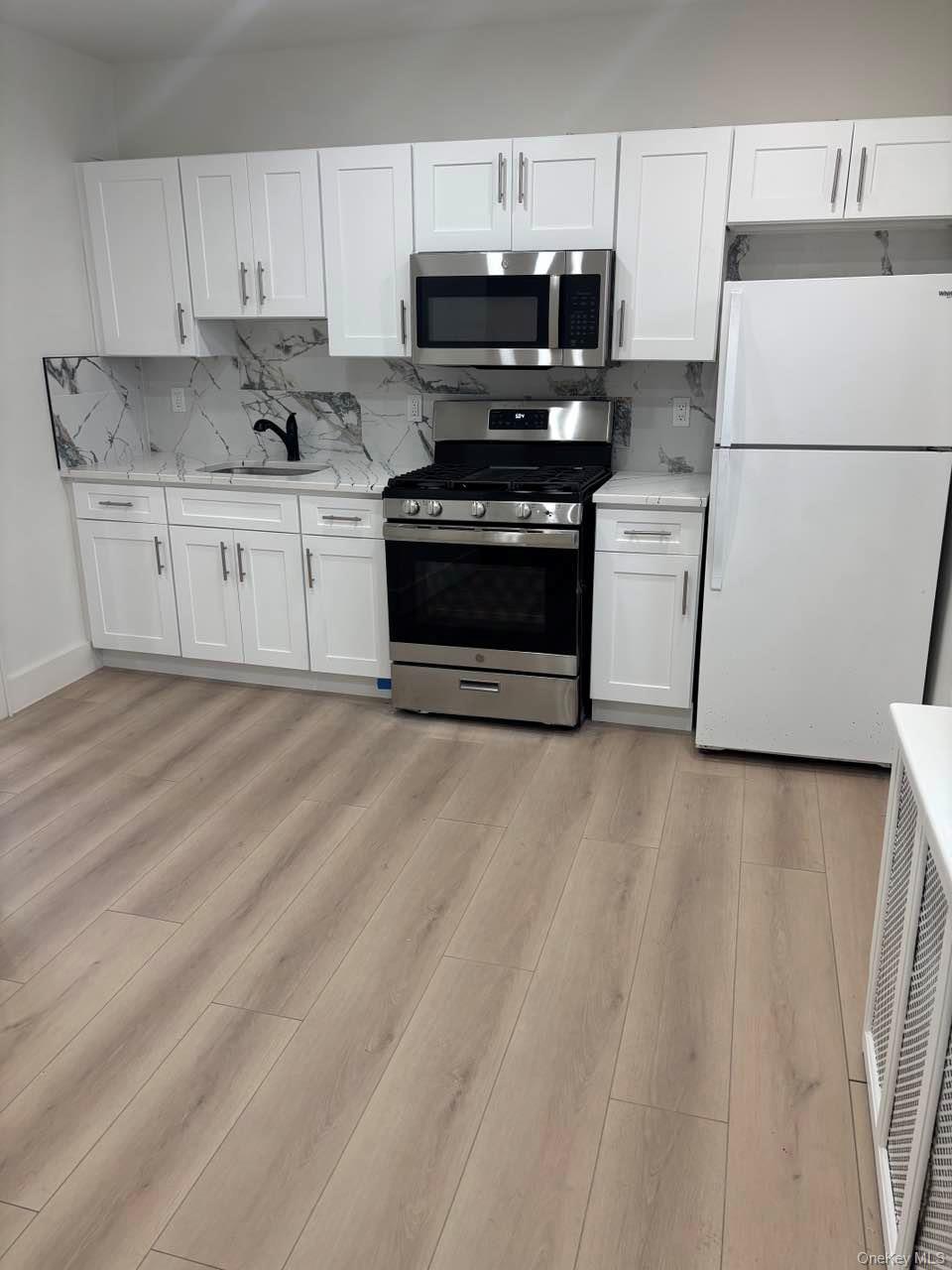 #5 photo, 28 Walt Whitman Road, Huntington Station , NY 11746