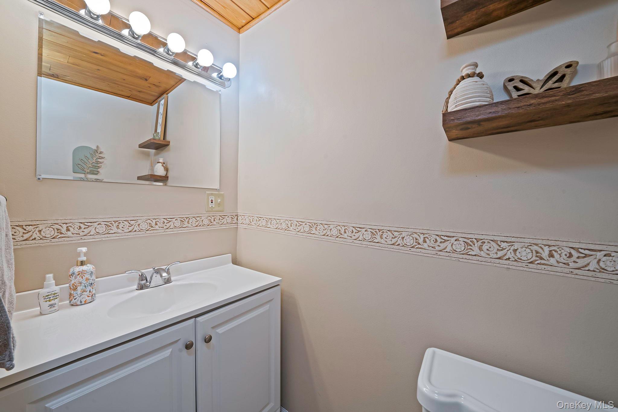 #15 photo, 126 Wauwepex Trail, Ridge , NY 11961