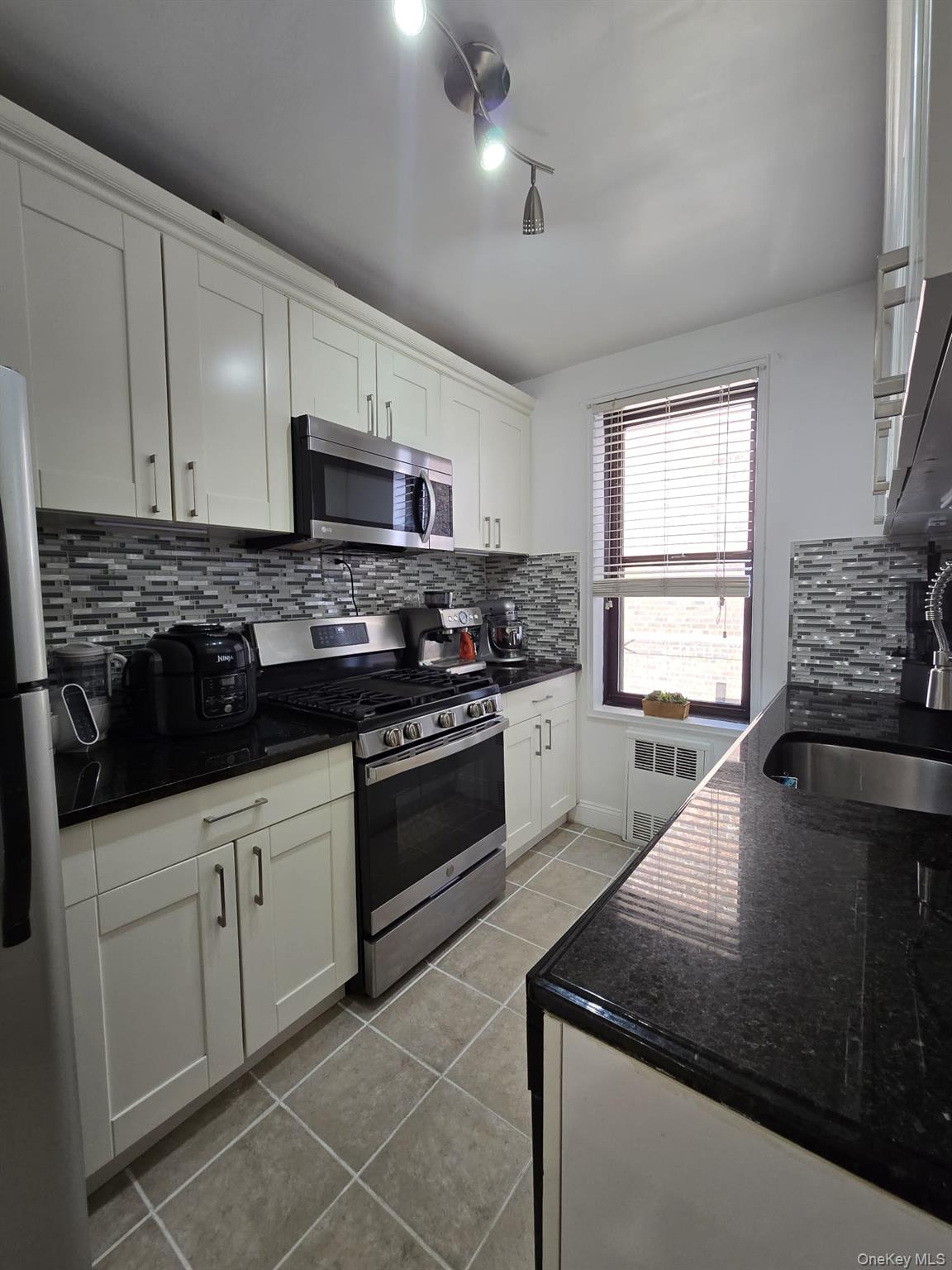 #16 photo, 226-26 Union Turnpike, Bayside , NY 11364