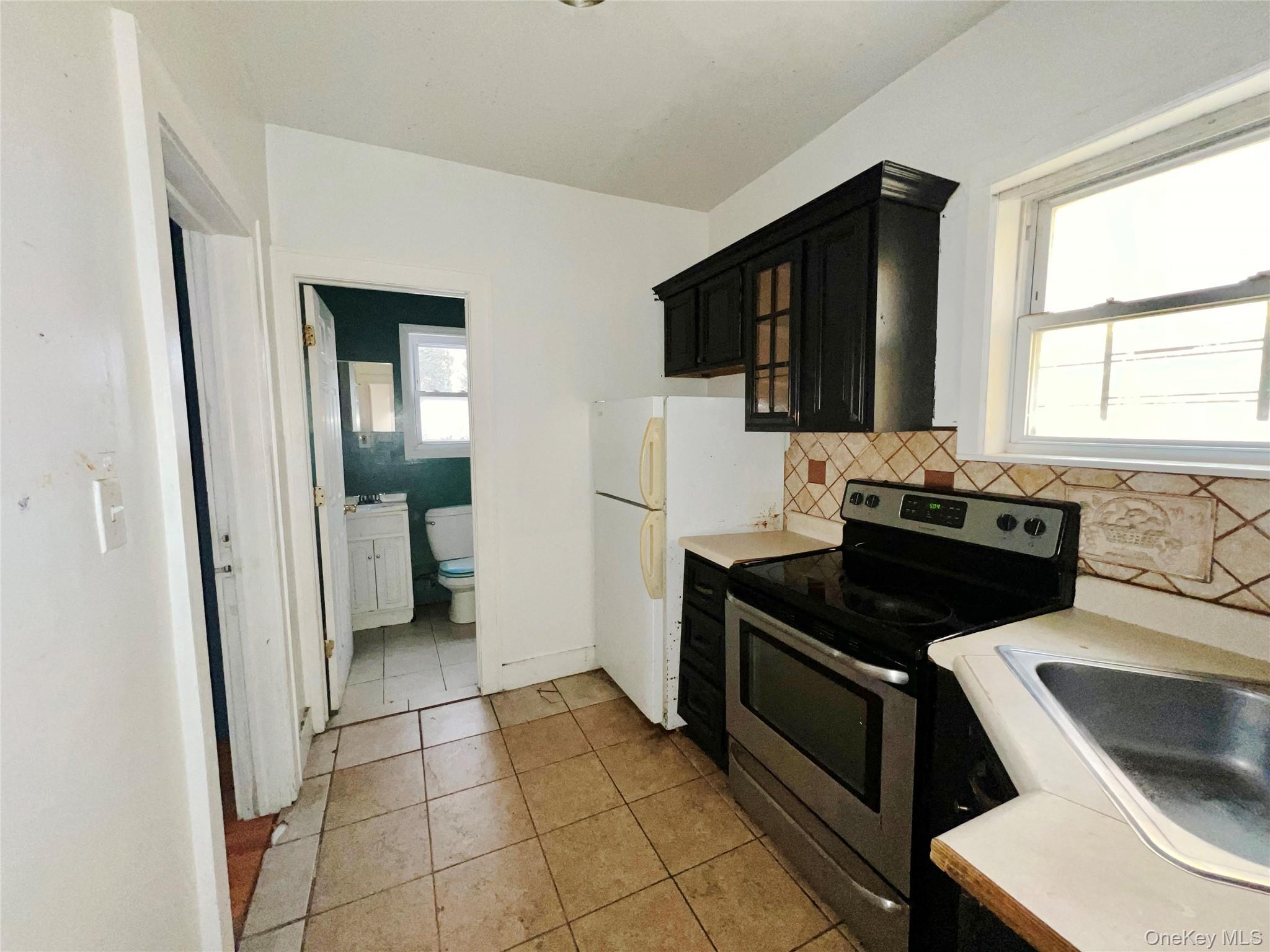 #7 photo, 13533 234th Place, कुईंस Rosedale , NY 11422