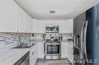 #10 photo, 32 Pine Tree Drive, Shirley , NY 11967