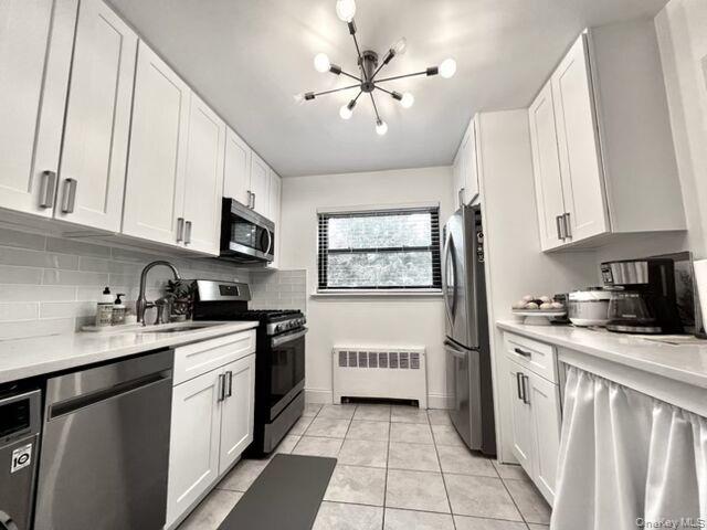 #4 photo, 74-80 220th Street, Bayside , NY 11364