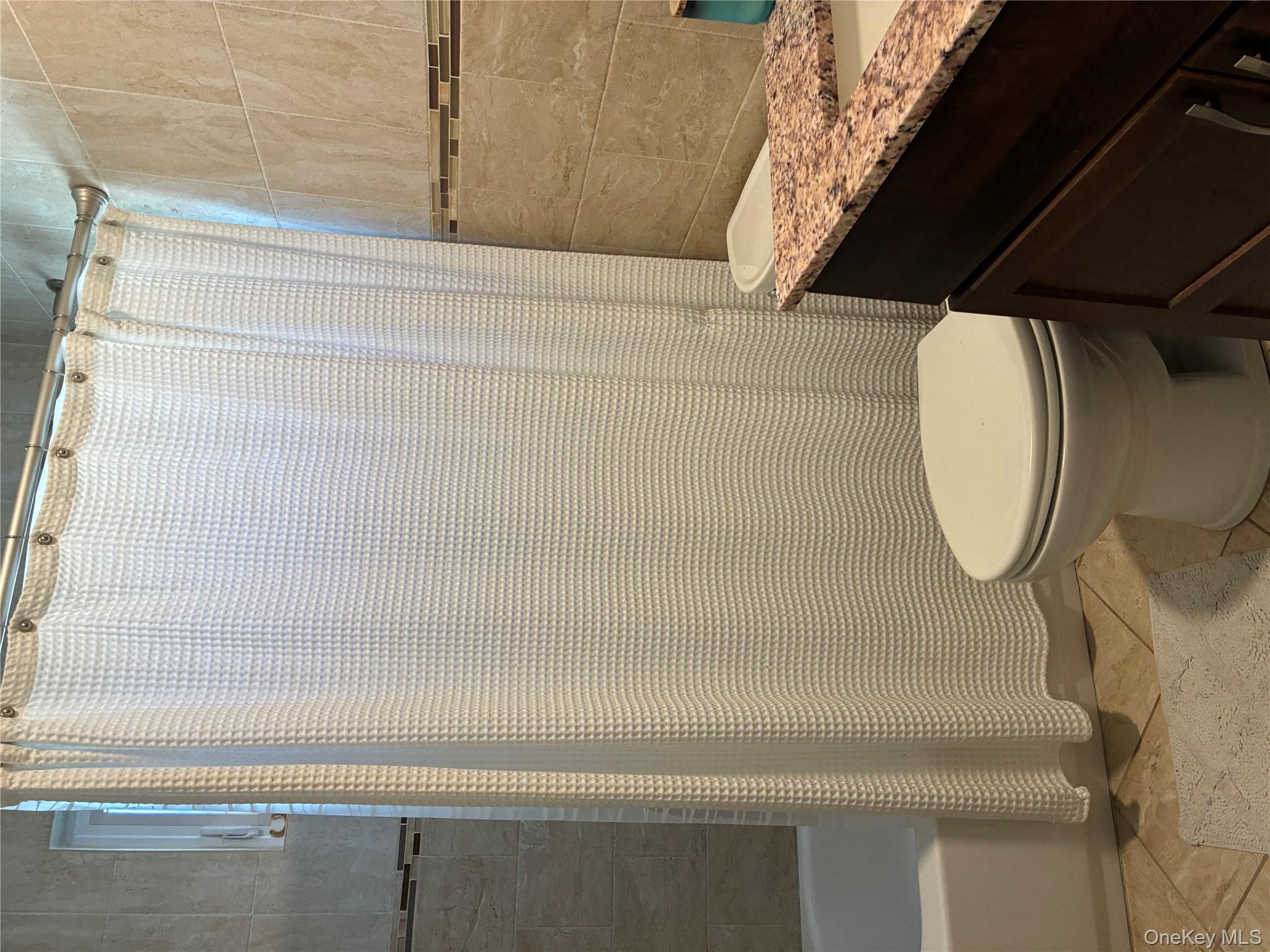 #16 photo, 65 Morning Glory Road, Levittown , NY 11756