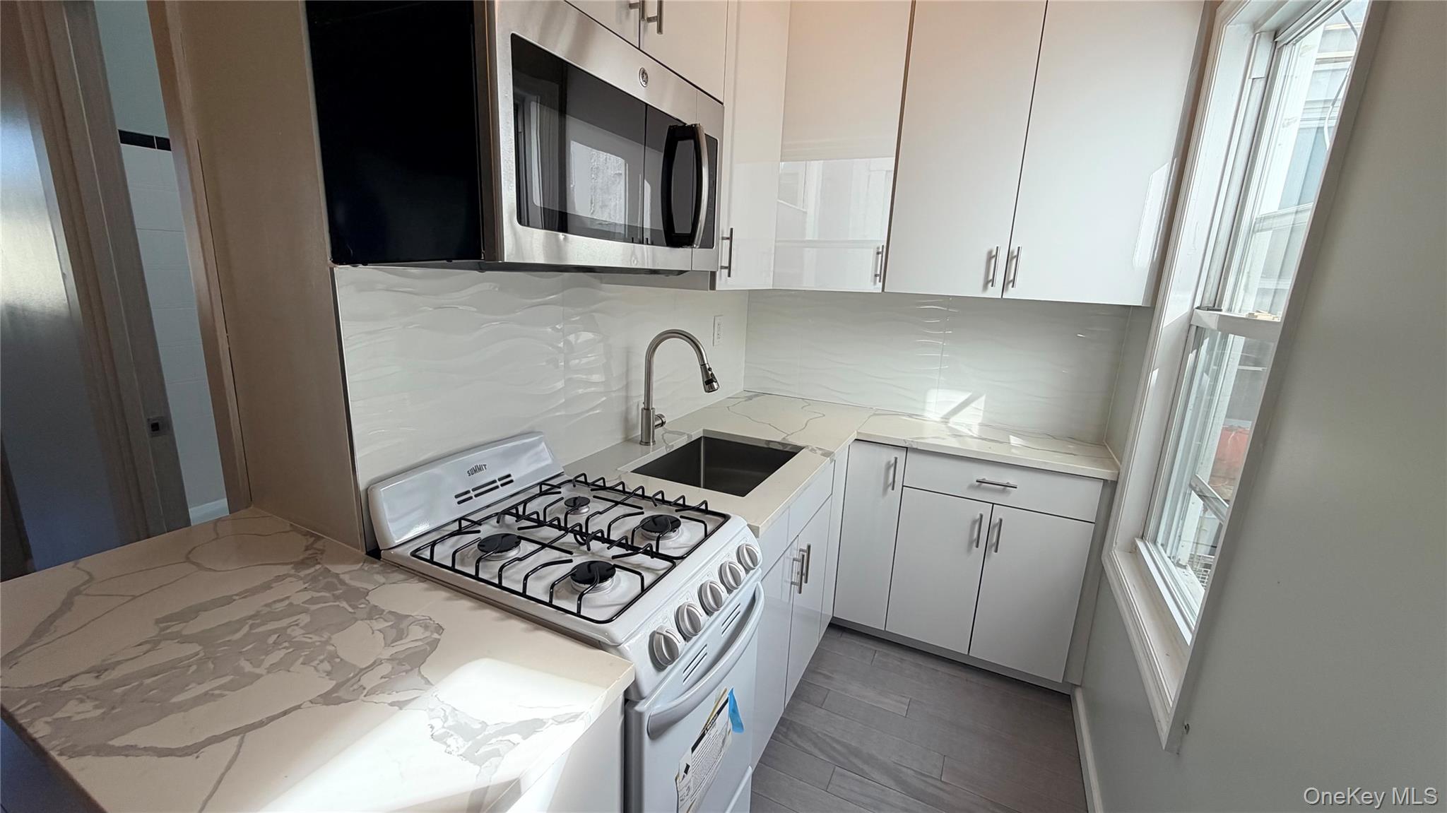 #3 photo, 9716 Metropolitan Avenue, Forest Hills , NY 11375