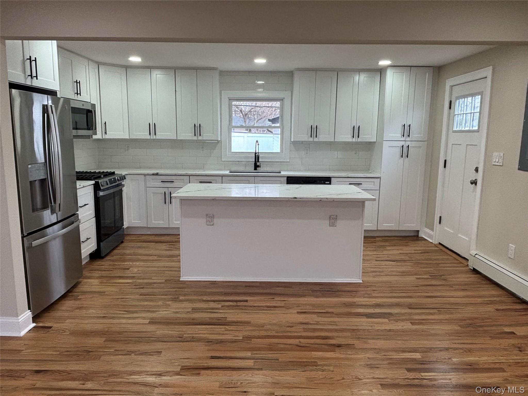 #2 photo, 38 Somerset Road, Amityville , NY 11701