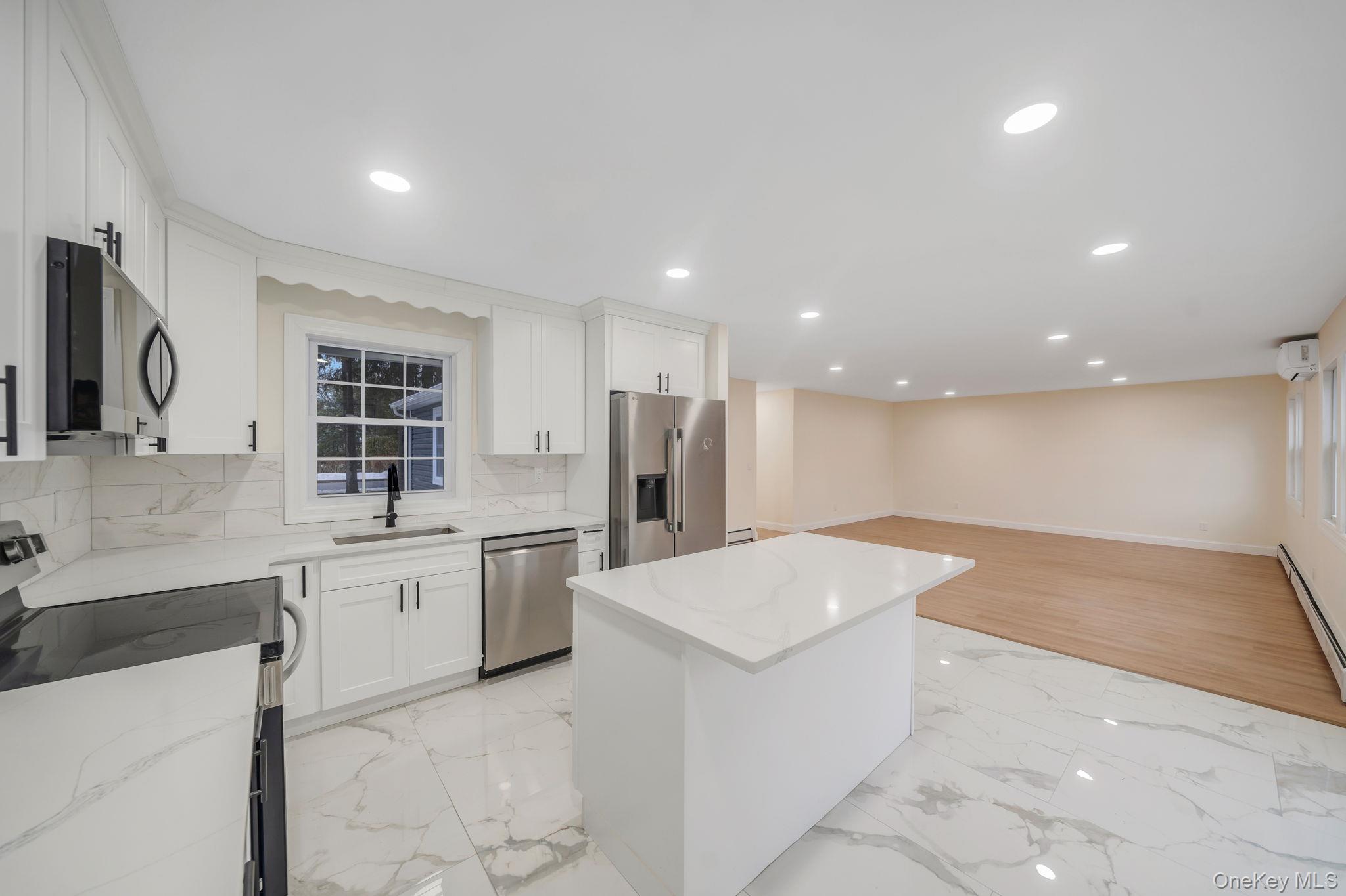 #11 photo, 50 7th Street, सफ़ोक काउंटी Saint James , NY 11780