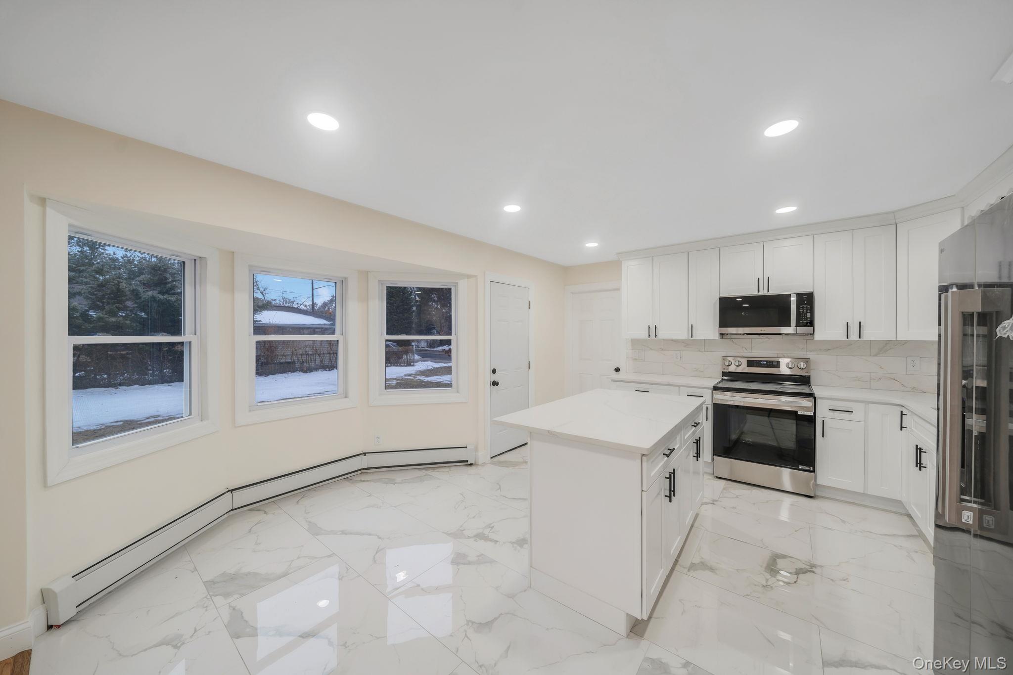 #12 photo, 50 7th Street, सफ़ोक काउंटी Saint James , NY 11780