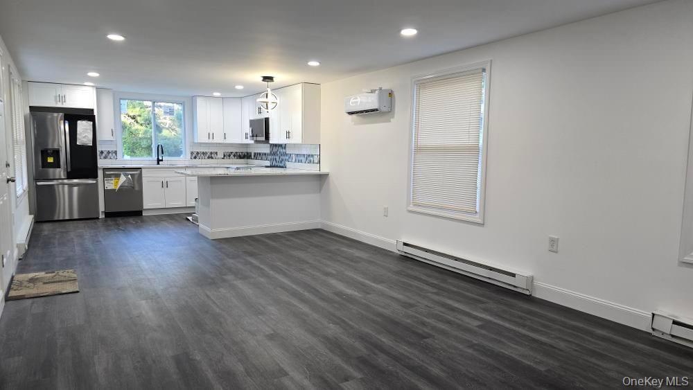 #13 photo, 135 Village Circle, Manorville , NY 11949