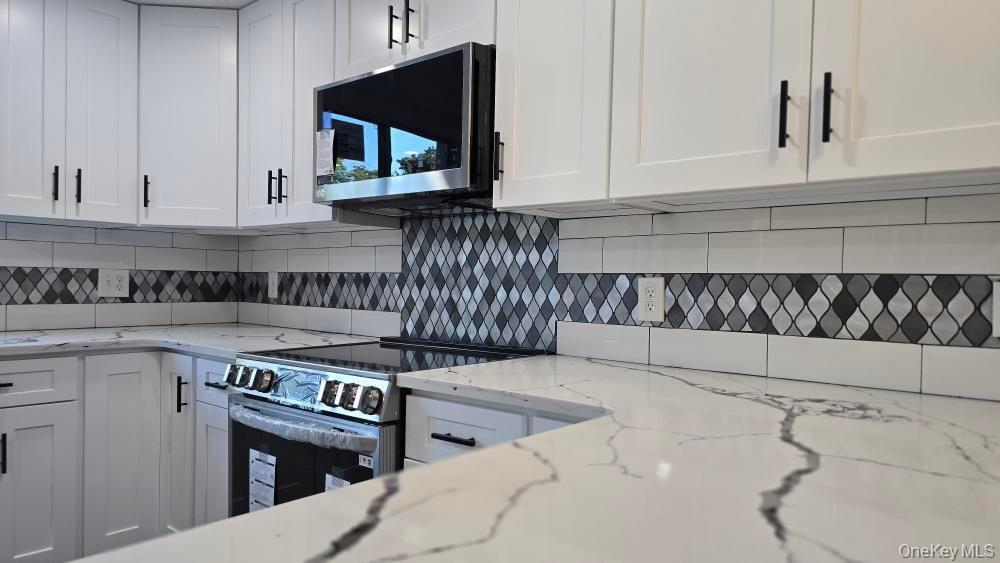 #9 photo, 135 Village Circle, Manorville , NY 11949