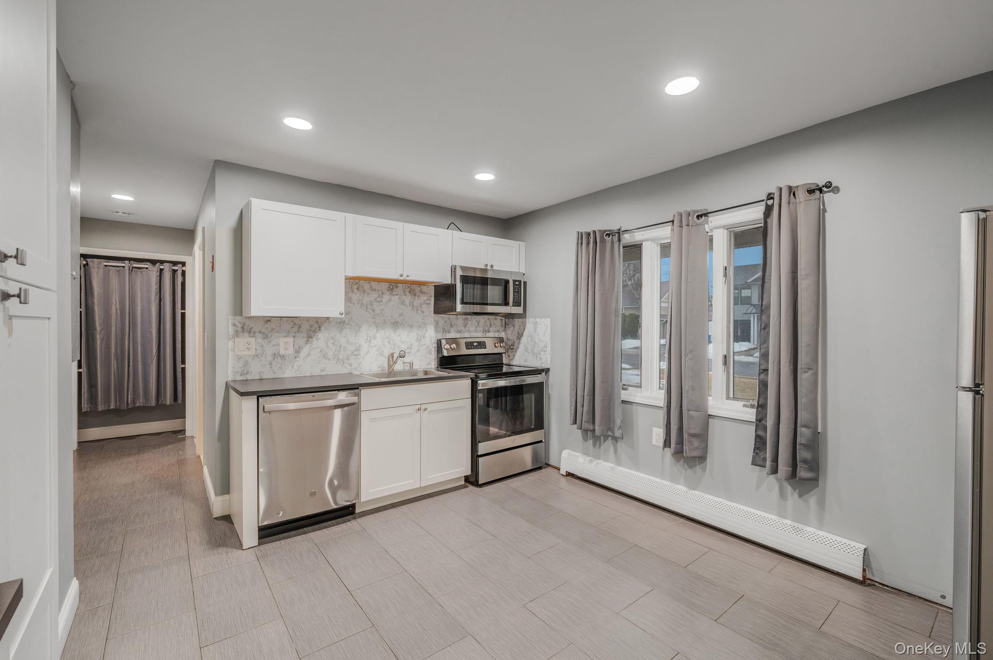 #12 photo, 27 Mallard Road, Levittown , NY 11756