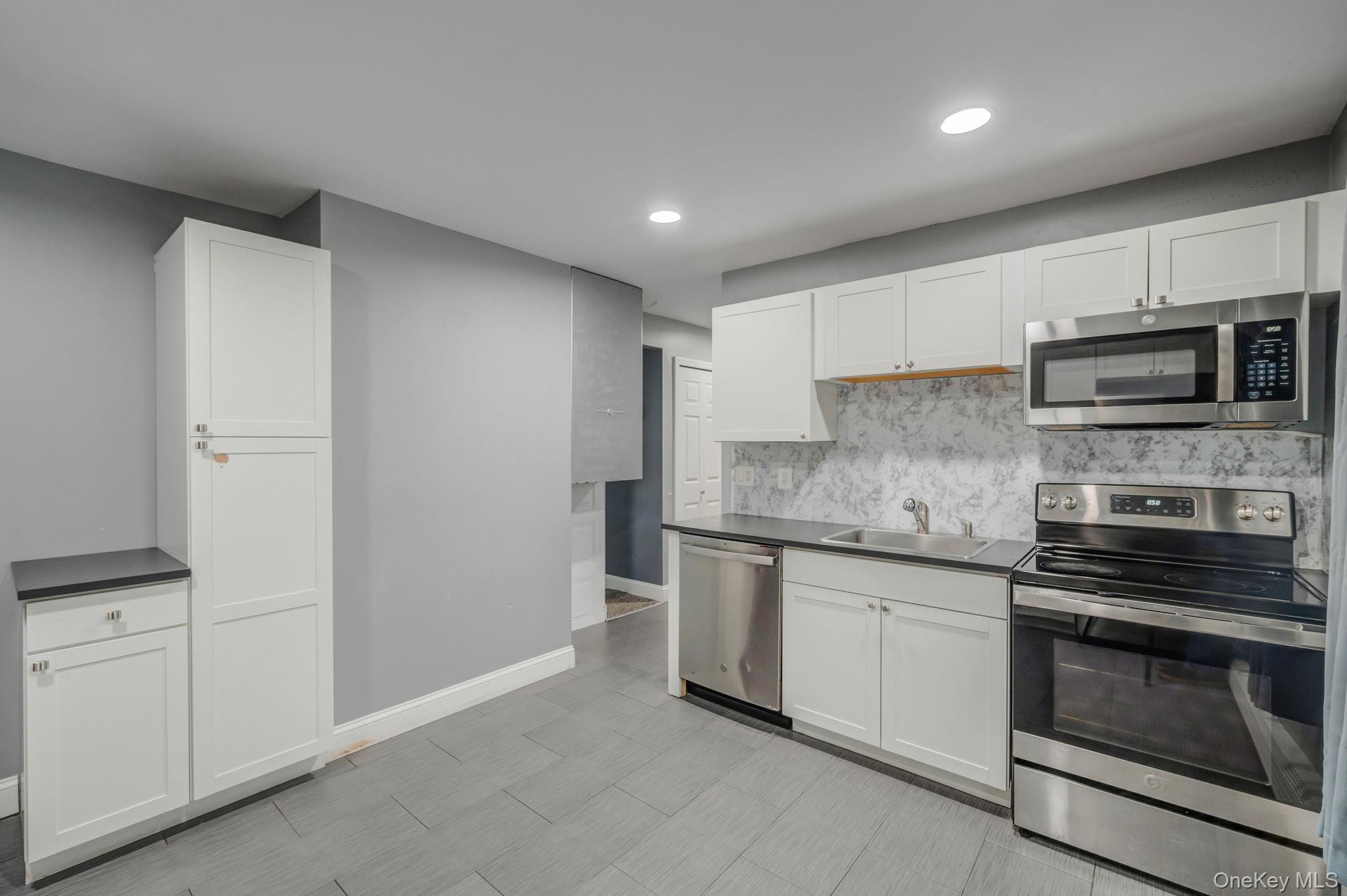 #14 photo, 27 Mallard Road, Levittown , NY 11756