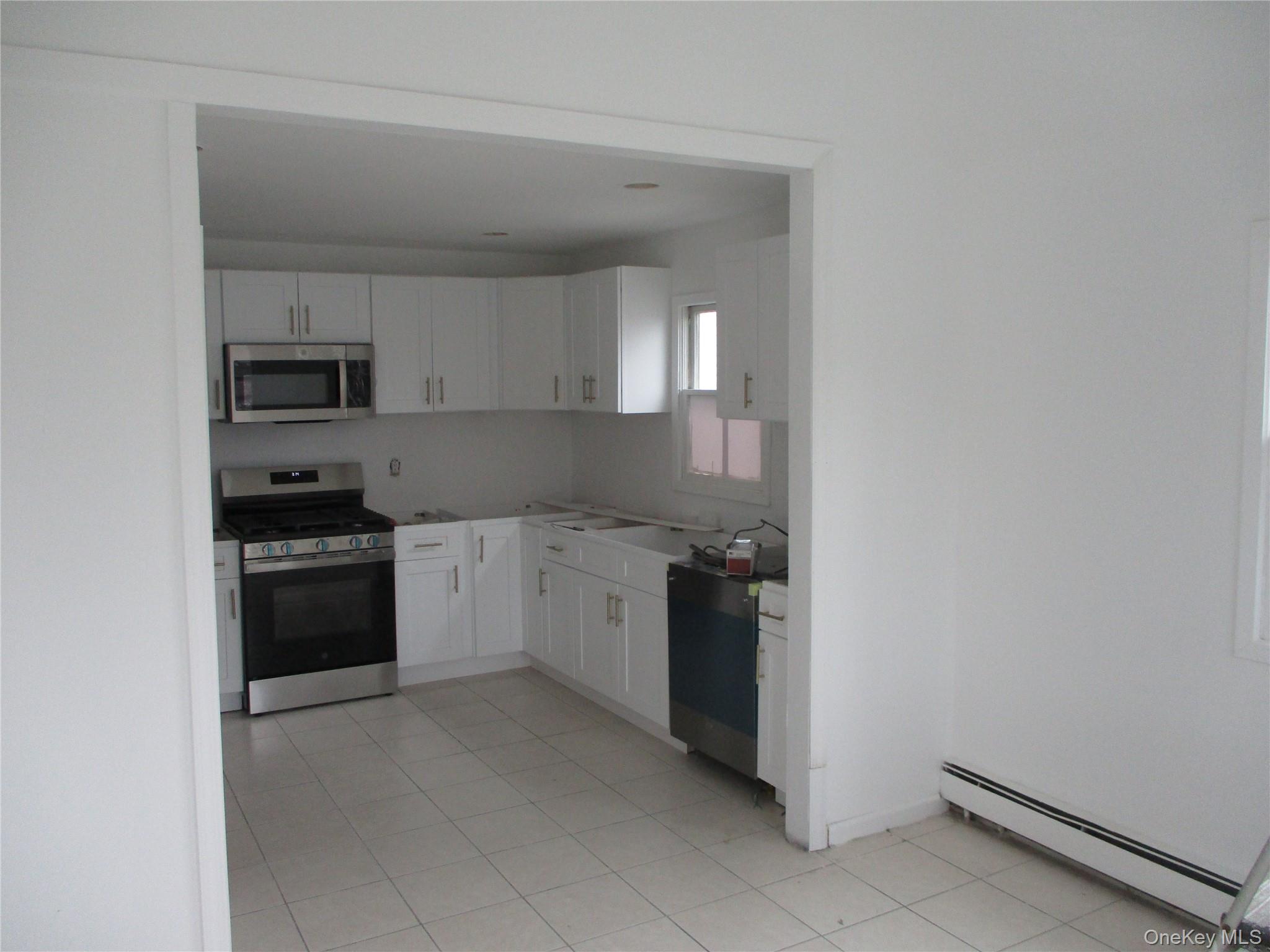 #3 photo, 94 Roger Avenue, Inwood , NY 11096