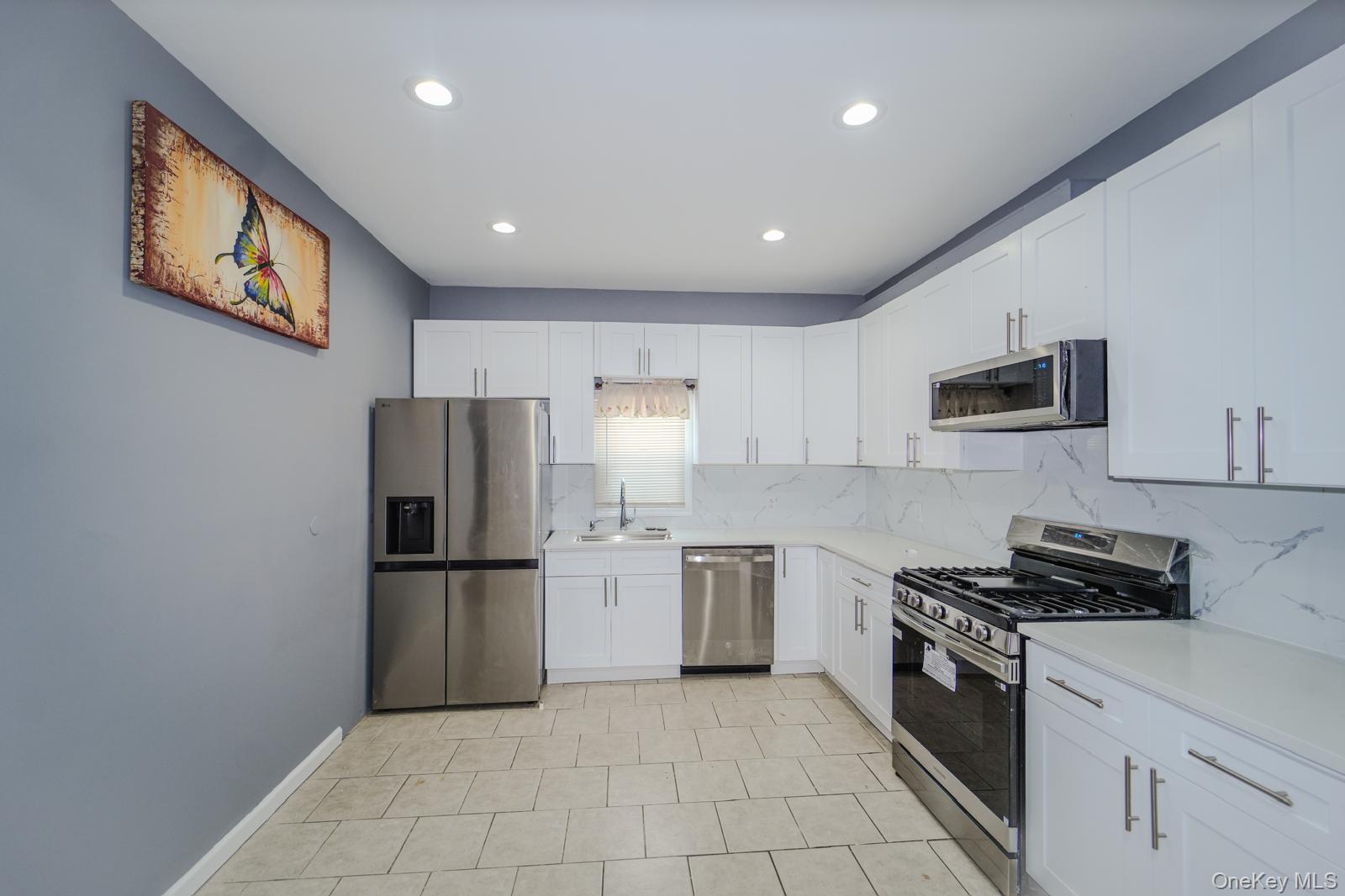 #10 photo, 587 Miller Avenue, Freeport , NY 11520