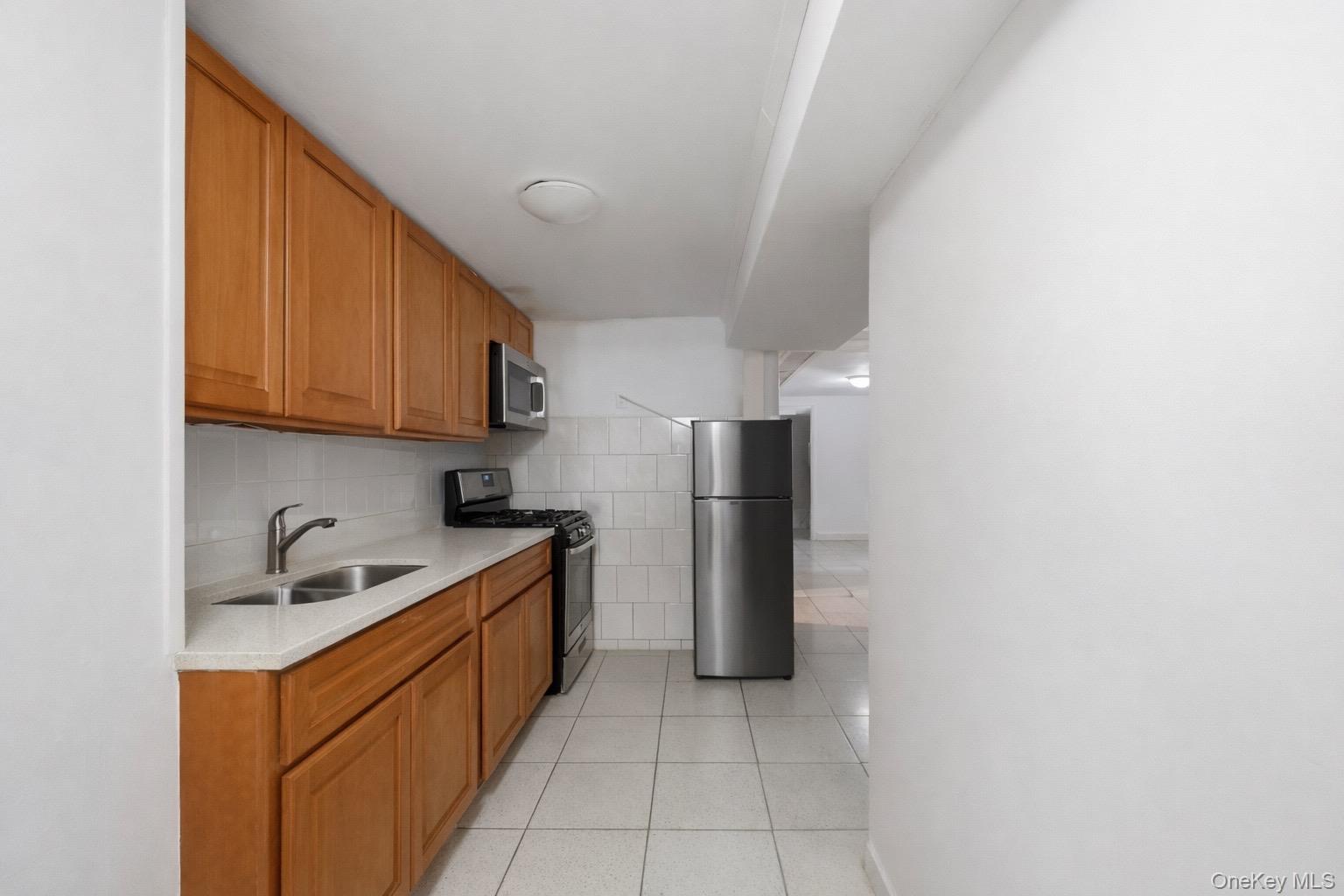 #12 photo, 10407 94th Avenue, Ozone Park , NY 11416