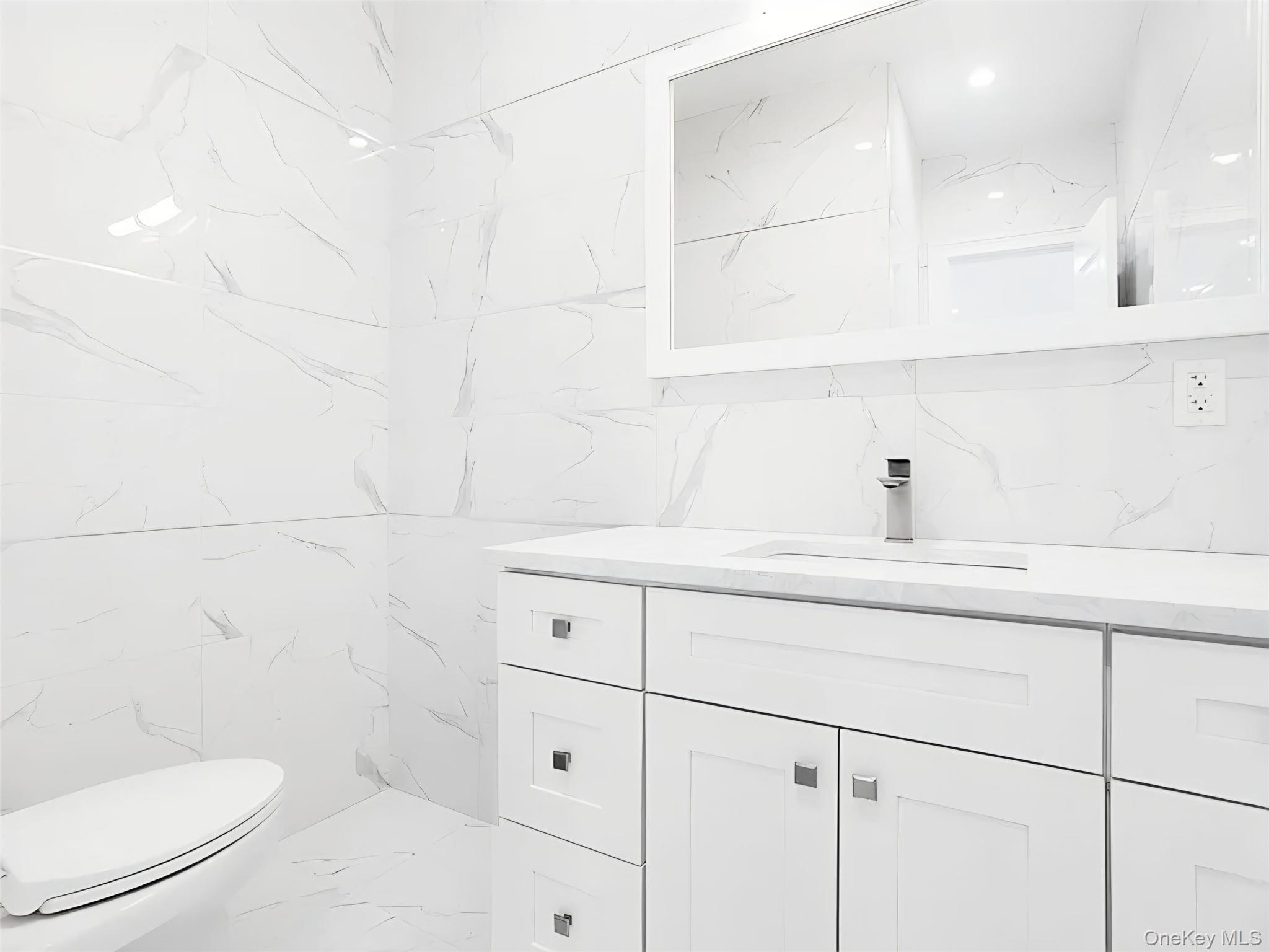 #11 photo, 56 Jackson Avenue, Mineola , NY 11501