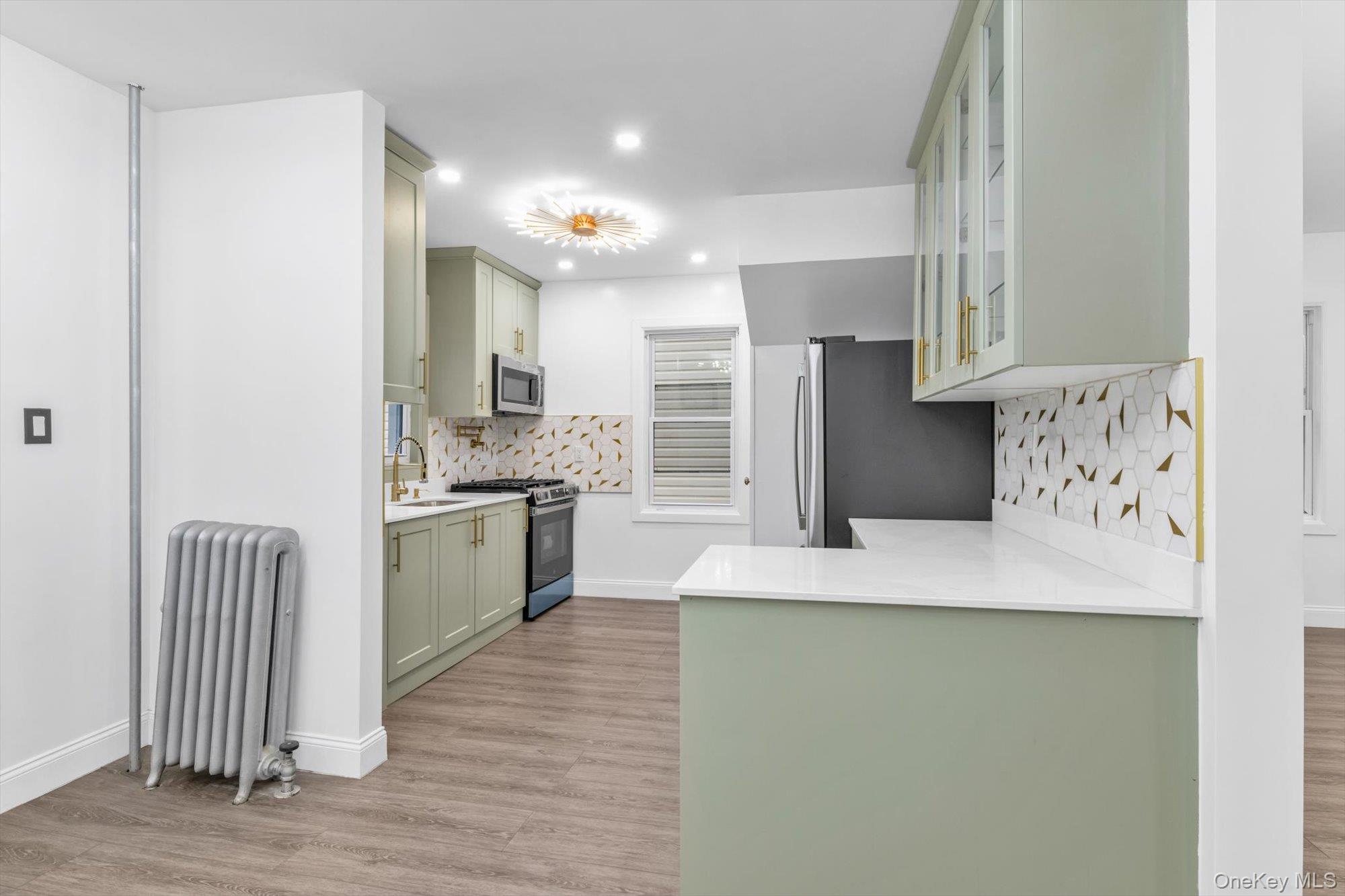 #8 photo, 9342 204th Street, Hollis , NY 11423