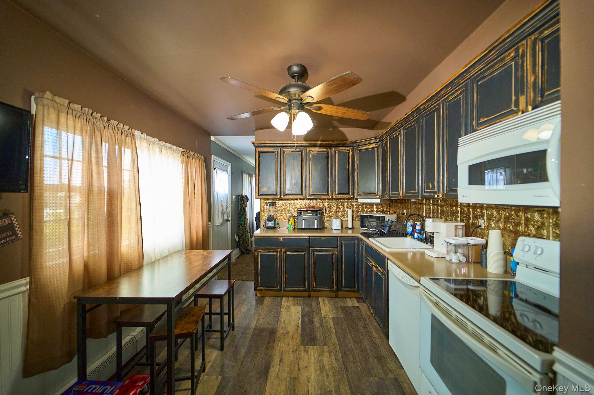 #7 photo, 50 Tower Lane, Levittown , NY 11756