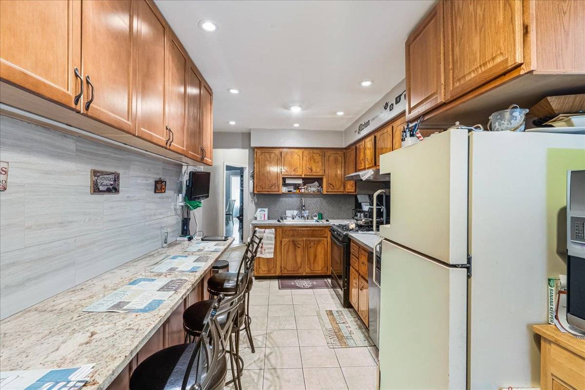 #7 photo, 13-15 124th St, College Point , NY 11356