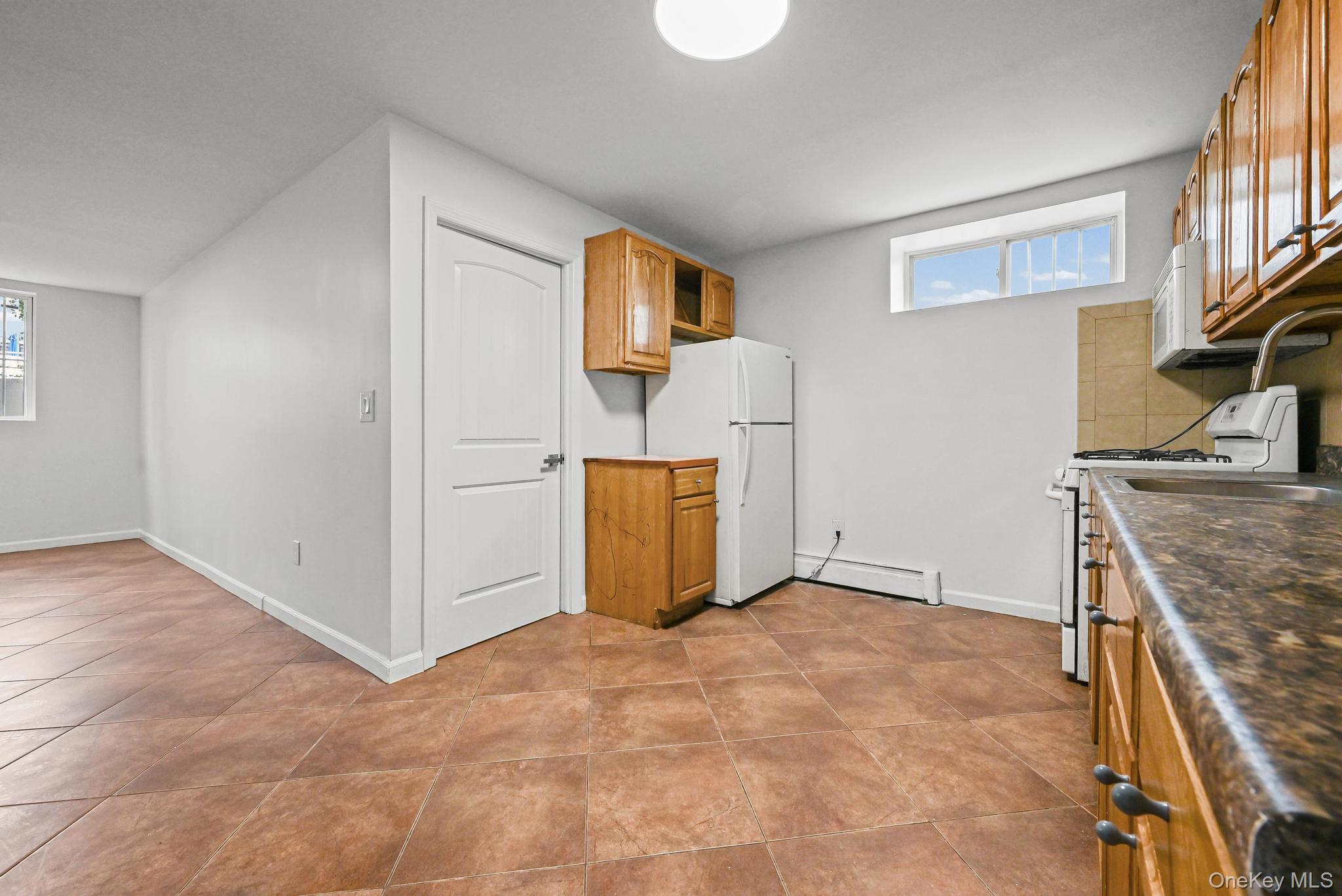 #19 photo, 93-29 91st Avenue, Woodhaven , NY 11421