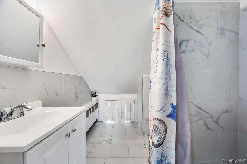 #17 photo, 63 Blacksmith Road, Levittown , NY 11756