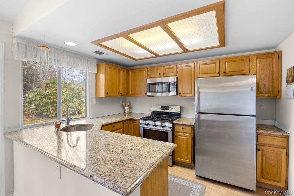 #20 photo, 16 Huntington Court, Ridge , NY 11961