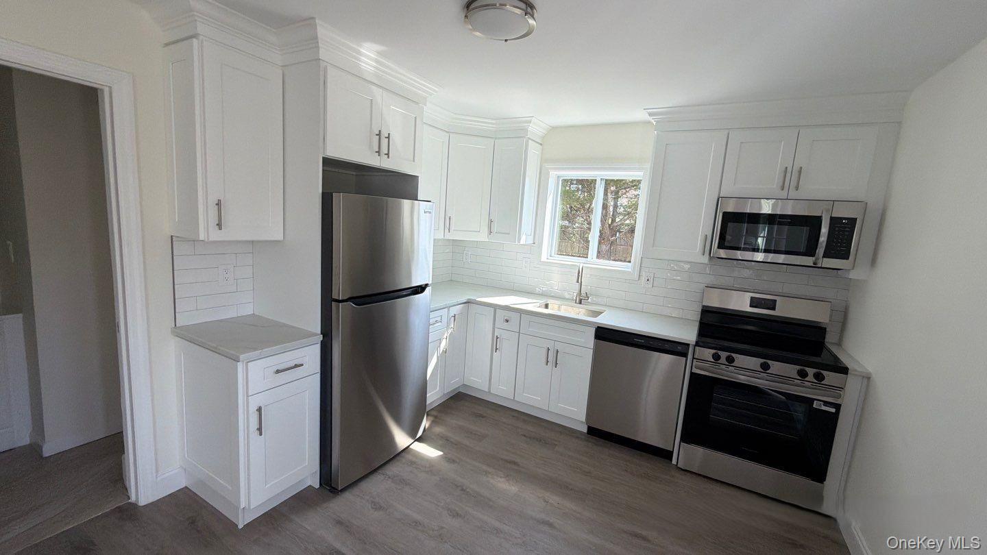 #4 photo, 7 Roan Lane, מחוז סאפוק Riverhead , NY 11901