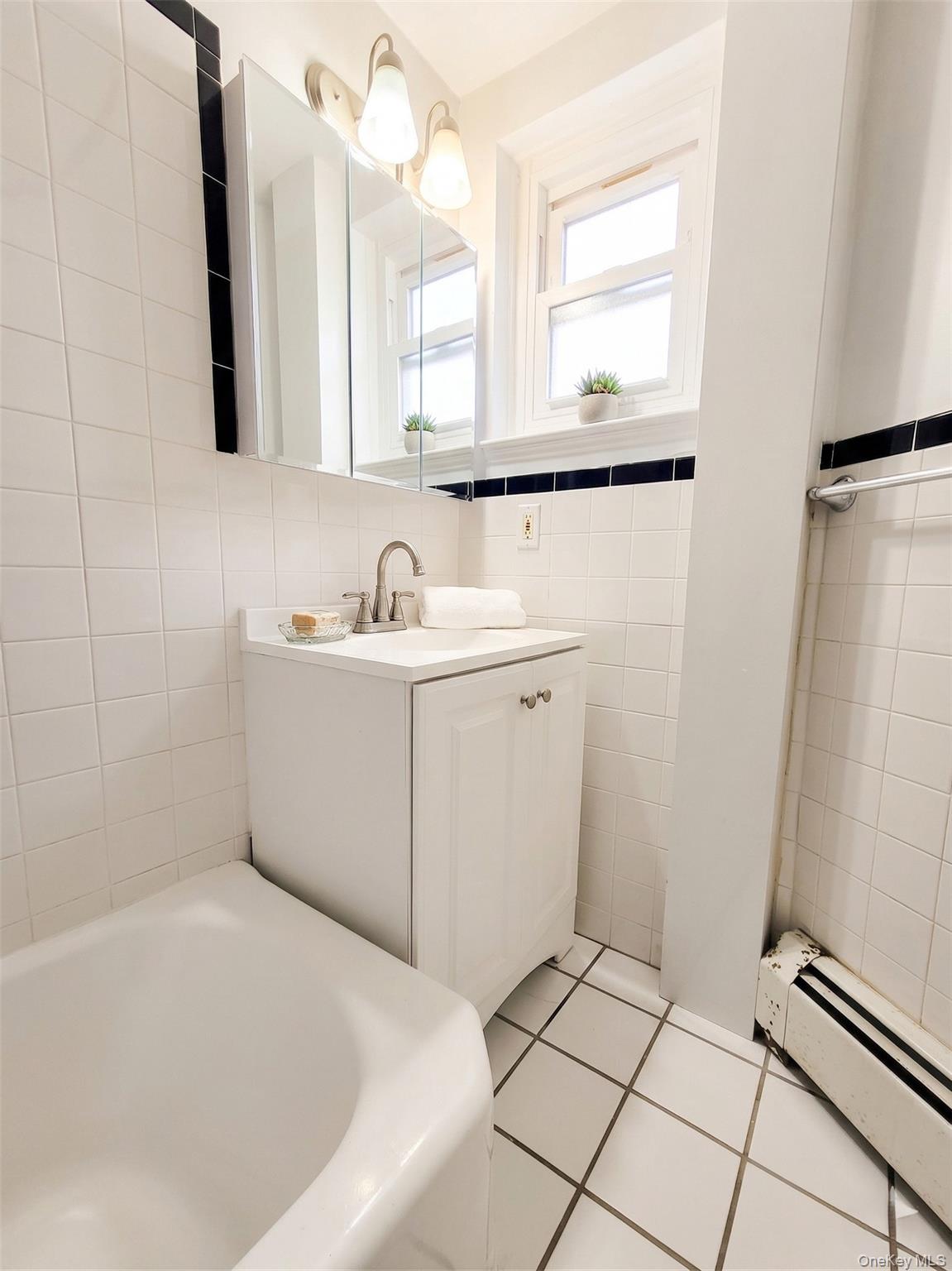 #14 photo, 147-15 Village, Briarwood , NY 11435