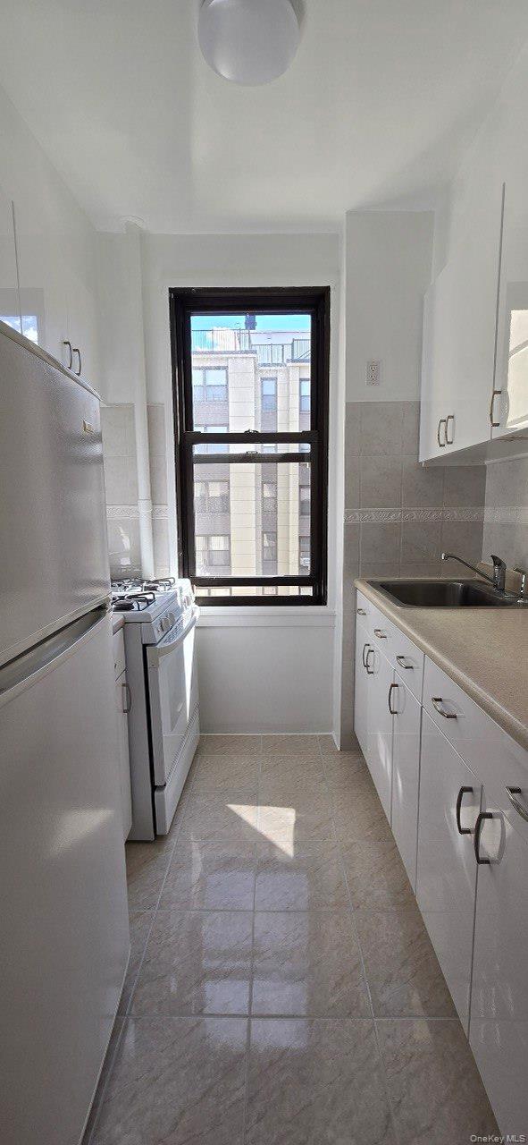 #11 photo, 98-34 63rd Drive, কুইন্‌স Rego Park , NY 11374