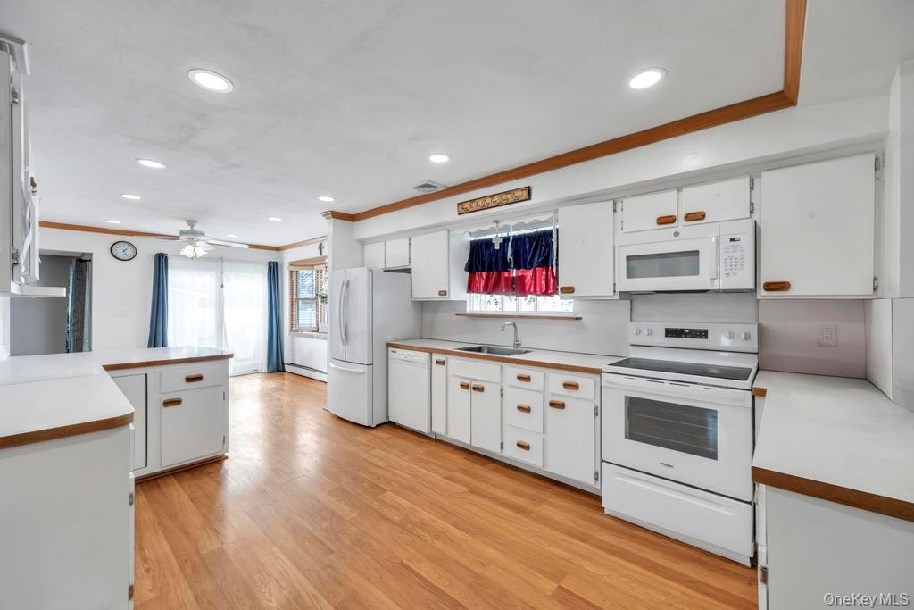 #15 photo, 30 County Line Road, Farmingdale , NY 11735