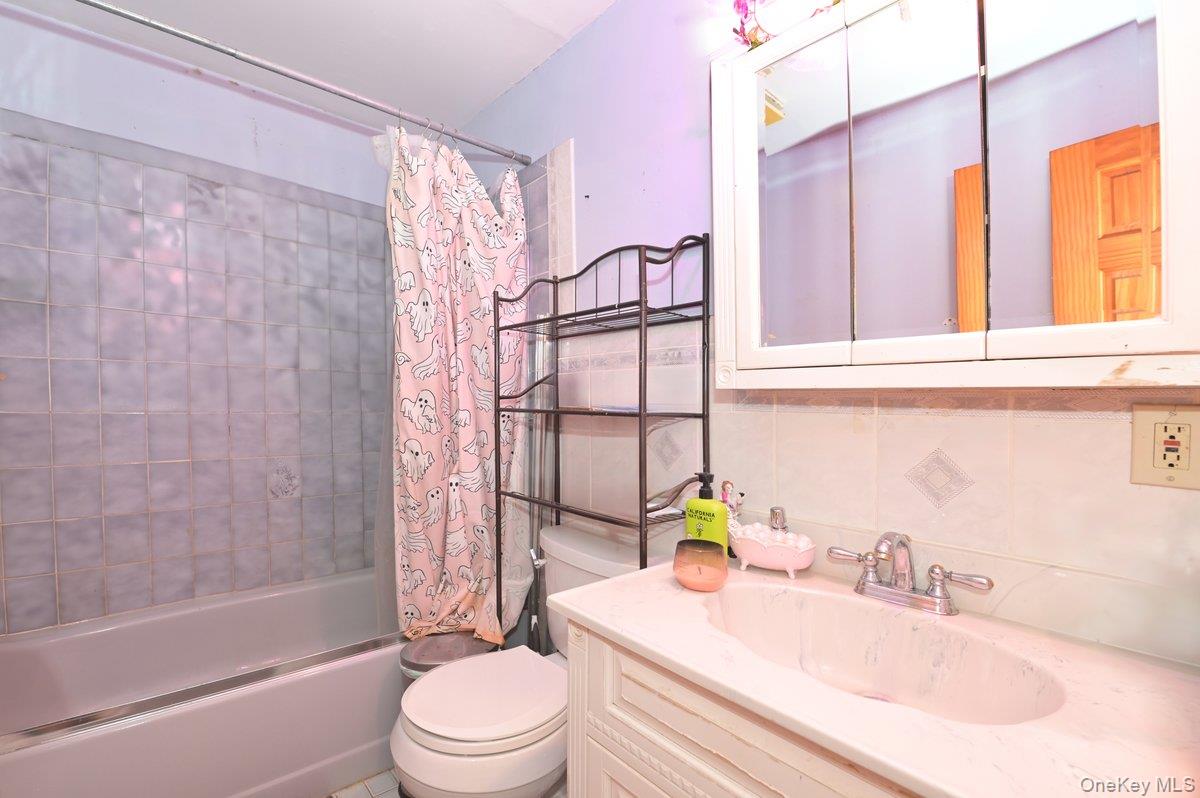 #12 photo, 313 Warren Street, West Babylon , NY 11704