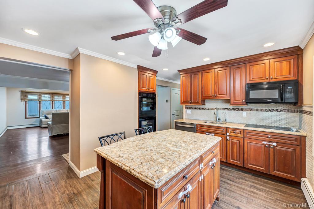 #8 photo, 26 Family Lane, Levittown , NY 11756