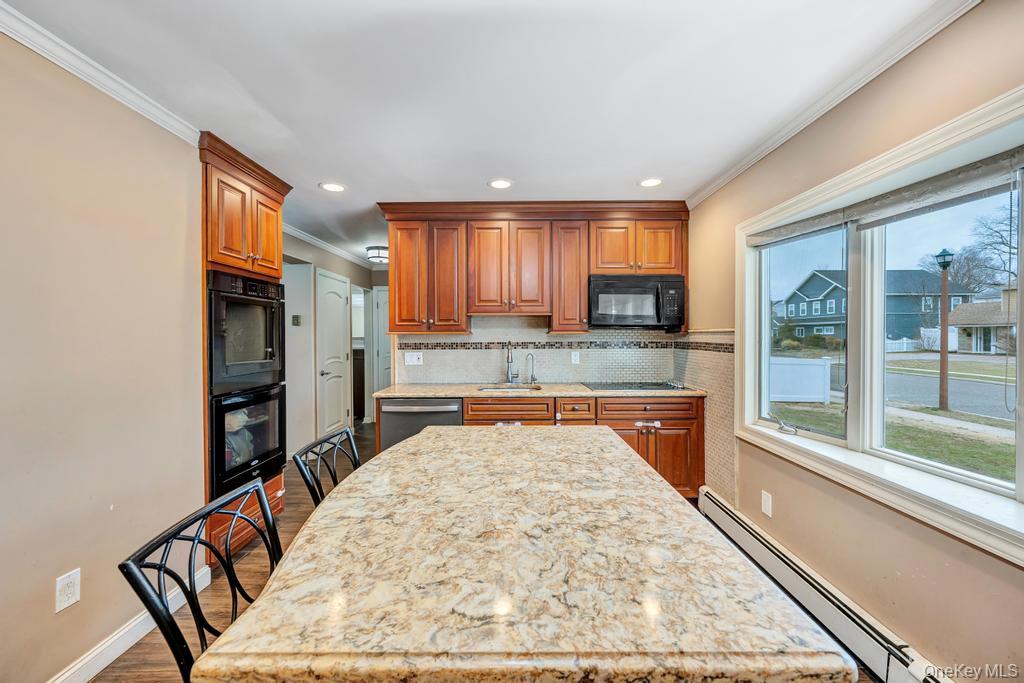 #9 photo, 26 Family Lane, Levittown , NY 11756