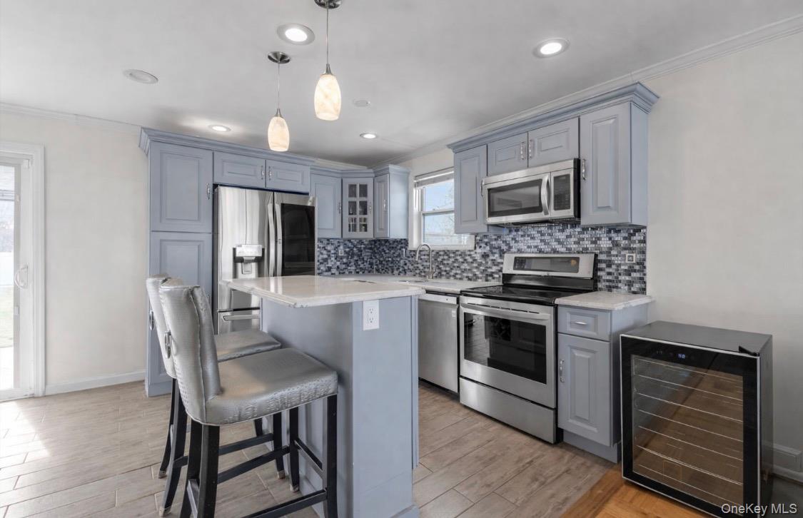 #3 photo, 15 Silverpine Drive, Amityville , NY 11701